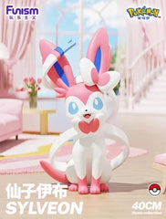 Funism is proud to present the next entry in their Pokemon Home Collection line: the adorable Sylveon! This exquisitely crafted figure captures the essence of the Fairy-type Pokemon! Add this adorable Pokemon to your collection today!
This 40cm (15.74-inch) tall figure is the perfect addition to any Pokemon collection. Whether displayed on a shelf or used for imaginative play,