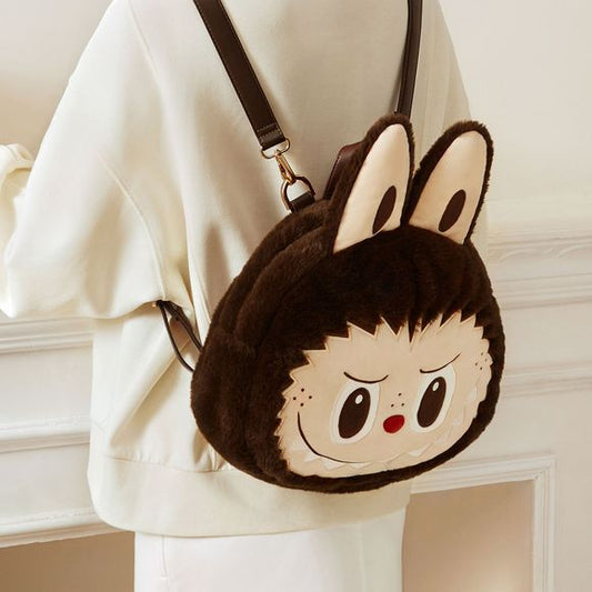 POP MART Classic Bag Series – LABUBU Big Head Backpack – authentic collectible backpack. The LABUBU Big Head Backpack from POP MART's Classic Bag Series is a playful, stylish piece that merges designer-toy aesthetic with everyday functionality.
Approximate size: 31 × 25 × 12 cm (≈12.2" × 9.8" × 4.7") — perfect for daily carry without being overly bulky. Authentic POP MART release.