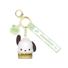 Add a bite-sized dose of Sanrio charm to your collection with the Langbowang Holly Box Sanrio Characters Snack Charm Vinyl Keychain - Pochacco! This adorable collectible features Pochacco styled as a delicious sandwich-inspired snack, complete with layered details that perfectly match the series' playful food theme.
Designed in soft pastel colors, the keychain includes a matching Pochacco logo strap and a decorative candy charm accent for extra sweetness. The detailed vinyl figure captures Pochacco's lovab