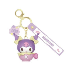 Treat yourself to a little Sanrio sweetness with the Langbowang Holly Box Sanrio Characters Snack Charm Vinyl Keychain - Kuromi! This adorable collectible features Kuromi peeking out from a pastel dessert cup decorated with her signature "K," combining her mischievous personality with a cute café-inspired design.
Finished in soft purple and pink tones, the keychain includes a matching Kuromi wrist strap and a decorative candy charm accent for an extra touch of sweetness. The detailed vinyl sculpt and durab