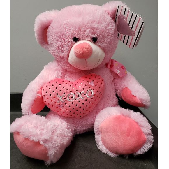 Show your special someone how much they mean to you with one of these cute stuffed bears. Sits about 15" tall while sitting.