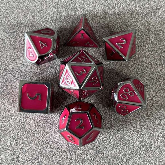 The perfect companion for your gaming needs! These premium die-cast polyhedral dice are exactly what you've been searching for that upcoming game night with the group. Each set weighs roughly 5 ounces and are stored in a quality, brushed metal tin with foam insert. These dice are engraved with crisp, easy-to-read numerals. Many styles and colors are available.
This set includes on of each: d20, d12, d10, d10 (percentile), d8, d6, and a d4 (7 dice in total). All inside the Galactic Toys Dice Tin.