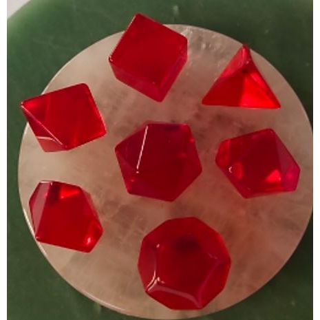The perfect companion for your gaming needs! These premium, high-end cut stone polyhedral dice are exactly what you've been searching for that upcoming game night with the group. Each set weighs roughly 8 ounces and are stored in a quality, brushed metal tin with foam insert. These dice are a rich quality stone with nice weight to them and engraved each with crisp, easy-to-read numerals. Many styles and colors are available.
This set includes on of each: d20, d12, d10, d10 (percentile), d8, d6, and a d4