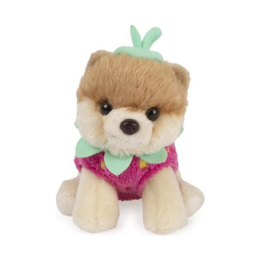 This collectible 5` plush features the popular Pomeranian stuffed animal with soft, premium plush fur and a pink strawberry outfit, complete with embroidered seed details, a leafy green collar, and matching green beret.