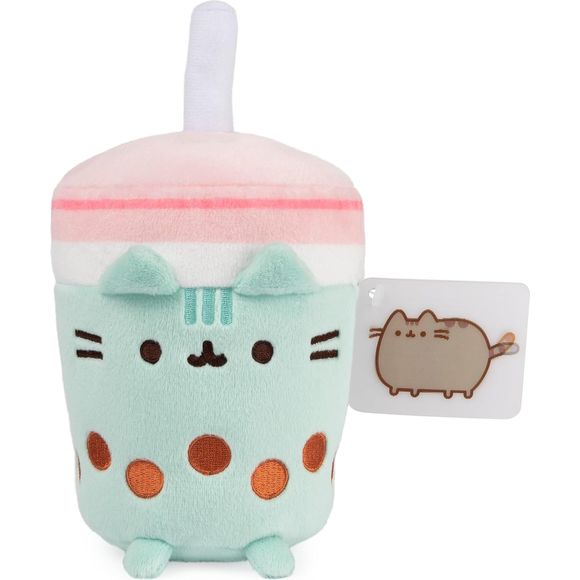 This eye-catching mint-green Pusheen boba cup plush stands six inches tall, complete with a straw, pink lid, and amber-colored embroidered tapioca pearls. Adorned with Pusheen’s signature smile, whiskers, striped tail, and feet, this tea sip is perfect for foodies and Pusheen collectors alike!