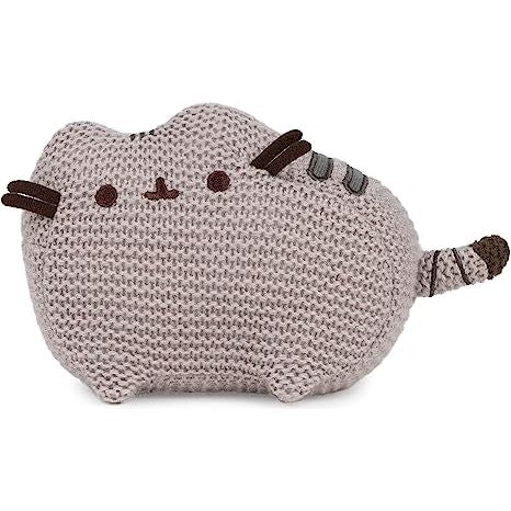 Pusheen, everyone’s favorite tubby tabby, is back with stylish new crocheted look!
This 6” plush features Pusheen in a classic standing pose with all-over knitting and the perfect size to fit any collection. This uniquely textured, soft plush adds a homespun look and makes the perfect piece of room décor for any pop culture fan or collector.
Each GUND Pusheen collection plush toy is designed with premium soft, surface-washable plush and ships in a protective poly bag. Appropriate for ages 8 and up.