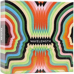 Wavelength is a party game where two teams compete to read each other’s minds. It’s a thrilling experience of TALKING and THINKING and HIGH FIVING that anyone can play—but it also has some of that deep word game sorcery, where your decisions feel tense, strategic, meaningful. Each round, one player has to guide their teammates to guess where a hidden target is located. But they can only give a clue on the spectrum between two concepts, like “Hot - Cold” or “Fantasy – Sci-Fi.” And the closer to the target’s