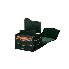 The DOMARU Armory Collection is our latest deck box line, built for strength, durability, and a commanding presence at the table. Featuring refined metallic details, a rugged textured exterior, and strong magnetic closures, each Armory box delivers uncompromising protection for serious play. Side Loading. Fits 100 double-sleeved cards. Includes 2 leather dividers. Strong Magnets. Sturdy textured leather materials and metallic details.