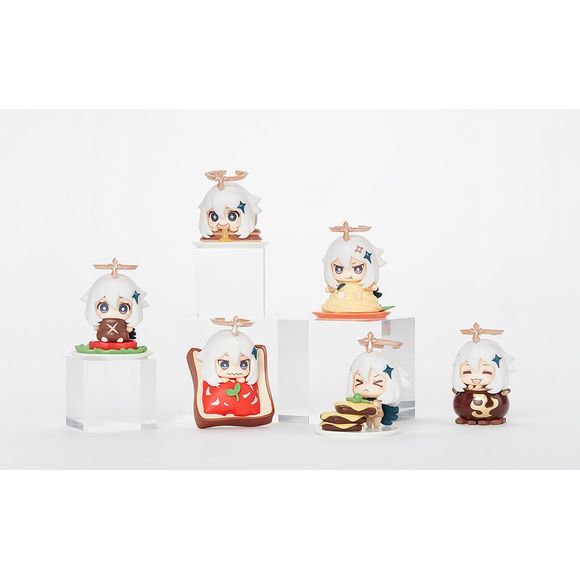 From the popular video game comes a Mascot Figure Collection set of Paimon! She is NOT emergency food, but she IS super cute eating different varieties of foods in a chibi-fied style.