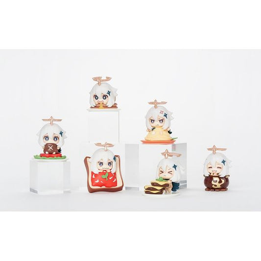 From the popular video game comes a Mascot Figure Collection set of Paimon! She is NOT emergency food, but she IS super cute eating different varieties of foods in a chibi-fied style.