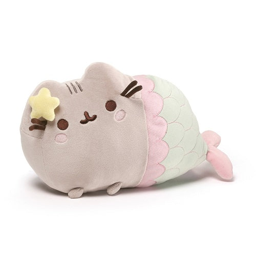 GUND is proud to present Pusheen — a chubby gray tabby cat that loves cuddles, snacks, and dress-up. As a popular web comic, Pusheen brings brightness and chuckles to millions of followers in her rapidly growing online fan base. This 12" plush brings the magical Pusheen Mermaid to life! Features an embroidered tail as well as a starfish bow. Surface-washable for easy cleaning. Appropriate for ages one and up. About GUND: For more than 100 years, GUND has been a premier plush company recognized worldwide for