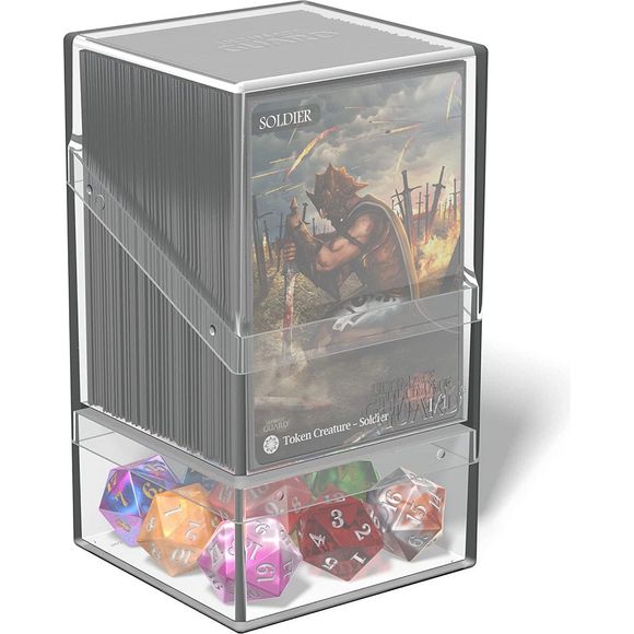 Ultimate Guard Boulder'n'Tray 100+ Clear. By popular demand, here is the Boulder'n'Tray 100+. This deck case combines the sturdiness of our Boulder with the flexibility of an extra compartment for your dice and other accessories - just like our classic Monolith. Our Boulder'n'Tray 100+ impresses with its durable, soft-touch finish², which ensures a comfortable grip and long life during all your gaming sessions. - Holds up to 100 standard size cards