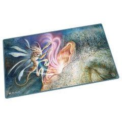 The 61x35cm playmat protects cards and sleeves while playing and improves the gaming experience thanks to its anti-slip underside, while the stitched edges guarantee an even longer service life. The top side of the Play-Mat is printed with officially licensed artworks from Magic: The Gathering's upcoming set 'Lorwyn Eclipsed'. Officially licensed Magic: The Gathering artwork Protects gaming cards and accessories during gameplay Anti-slip underside for maximum gaming grip. Natural rubber 2mm thick soft cushi