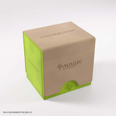 Protect and organize your Commander deck with the Magic: The Gathering Reality Fracture Sidekick PRO 100+ XL featuring Vigorbloom. This premium MTG deck box holds 100+ double-sleeved cards, including cards in extra-thick inner sleeves, with additional space for tokens or a sideboard. A removable UV-protected Slide Card Case lets you display your Commander while keeping it protected. The hidden drawer stores dice and tokens, while Gamegenic’s convertible cover attaches to the bottom to save table space and p