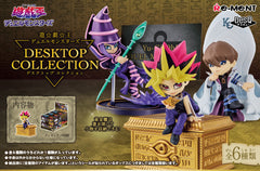 Your favorite characters from "Yu-Gi-Oh Duel Monsters" are ready to help keep your desk more organized with this group of items from Re-Ment! Each carefully sculpted desk accessory can help you keep small items in place on your desktop; they're also happy to hang out in your collection. You will receive one RANDOM figure

[Lineup]:

Yami Yugi (accessory case)
Black Magician (memo stand)
Seto Kaiba (sticky note stand)
Blue-Eyes White Dragon (pen stand)
Katsuya Jonouchi (smartphone stand)
Red-Eyes Black Drago