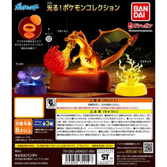 Bring the world of Pokémon to life with the Bandai Pokémon Light-Up Collection Gashapon Series! Each blind capsule contains one randomly selected miniature display figure featuring a built-in light-up effect that highlights your favorite Pokémon in an eye-catching glow.

This collection includes three popular Pokémon designs: Charizard breathing a blazing stream of fire, Pikachu surrounded by crackling electricity, and Gengar conjuring a mysterious energy orb. Each figure sits atop a themed display base tha