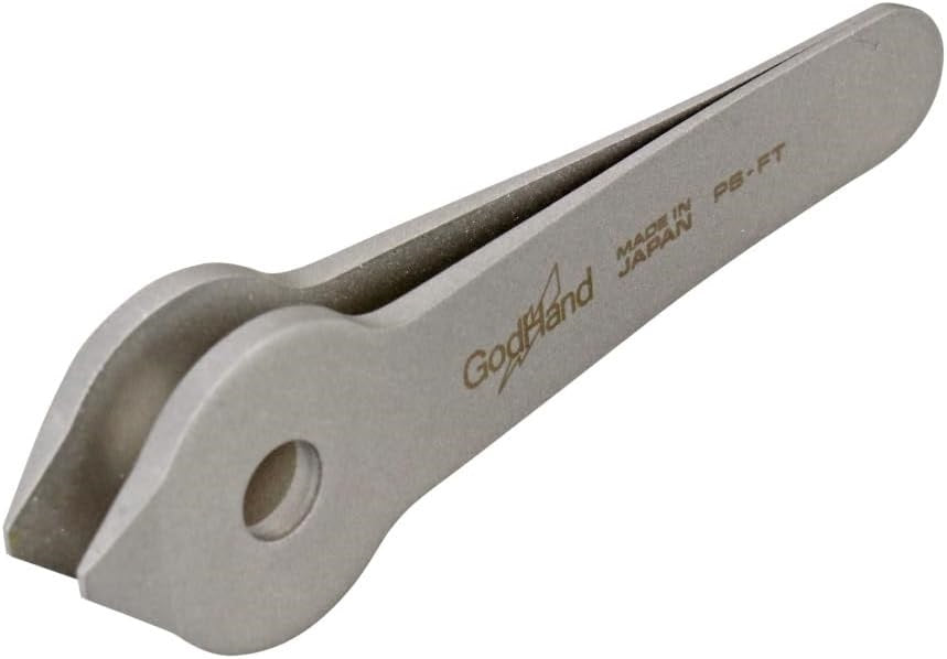 <p>Handle small parts with greater control using the <strong>GodHand Fingertip Tweezers GH-PS-FT</strong>.</p>

<p>These compact tweezers are designed to feel more like pinching an object directly with your fingertips, making them ideal for delicate model-kit parts, decals, small accessories, and precision hobby work.</p>

<p>The rounded hole at the grip end allows the tweezers to be rotated in your hand, giving you multiple holding styles depending on the task. You can cradle the tool in your hand for clos