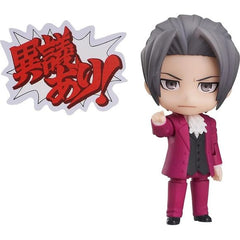 PRE-ORDER: Expected to ship in April of 2027.

"I will get every defendant declared guilty. That is my policy."

From the popular courtroom battle game series "Phoenix Wright: Ace Attorney" comes a Nendoroid of Miles Edgeworth! He comes with three face plates including a standard expression, an angry expression and a smug expression.

Optional parts include his courtroom desk, a court document and "Objection!" and "Hold it!" text plates in English, Japanese and simplified Chinese (total of 6 text plates). T