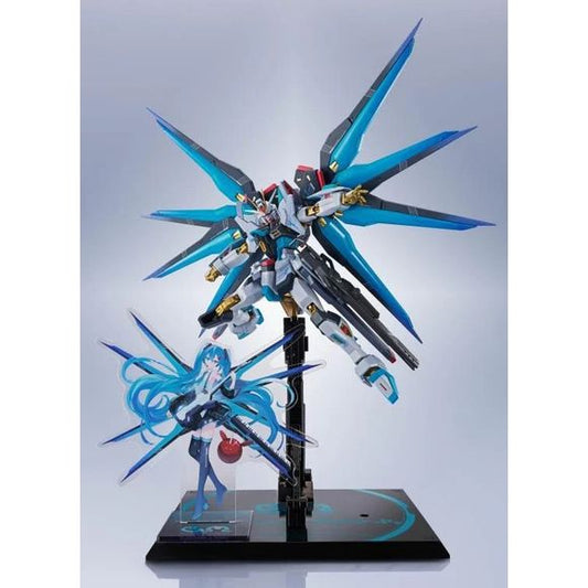 As part of the "Gundam 45th Anniversary x Hatsune Miku" special collaboration project, the Metal Robot Spirits Strike Freedom Gundam Type II [Hatsune Miku version] is now available!

This special coloring version, exclusive to this project, incorporates Hatsune Miku 's distinctive coloring into Strike Freedom Gundam Type II. It comes with an acrylic stand of Hatsune Miku x Strike Freedom Gundam Type II, specially drawn for this product. You can enjoy the collaboration by displaying it together with METAL RO