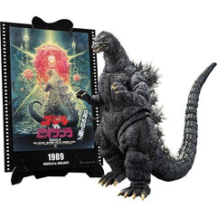PRE-ORDER: Expected to ship in March of 2026

Bandai's "S.H.MonsterArts" figure of the mighty Godzilla, as seen in 1989's "Godzilla vs. Biollante," returns with a paper craft of the stunningly designed movie poster! Sculpted by Godzilla-meister Yuji Sakai and based on the suit used in the film, this figure boasts incredibly detailed texture and coloring, as well as articulation that adds supreme posability without disrupting Godzilla's proportions