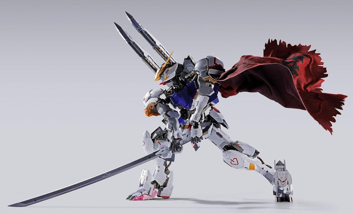 The long-awaited Metal Build version of Gundam Barbatos includes new equipment devised by director Tatsuyuki Nagai and designed by mechanical designer Naohiro Washio, and features a new look complete with a Boomerang Mace and crimson-colored cape!

The frame portion is made with die-cast components, incorporating unique structures in the fuselage and other areas. The Gundam frame, which embodies the Alaya-Vijnana System, is dynamically depicted in this figure. 7.1 inches tall (18cm). Made of ABS, PVC, and d