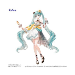 <p><strong>PRE-ORDER: Expected to ship in May of 2027.</strong></p>

<p>Hatsune Miku teams up with <strong>TIROL CHOCO</strong> for a special alternate-color version of the <strong>Coffee Nougat</strong> collaboration figure from FuRyu!</p>

<p>Based on artwork by <strong>Hiten</strong>, Hatsune Miku is dressed in an elegant confectionery-inspired outfit featuring soft white tones, turquoise accents, and warm gold and yellow details unique to this <strong>Another Color Ver.</strong> Her flowing twin tails,