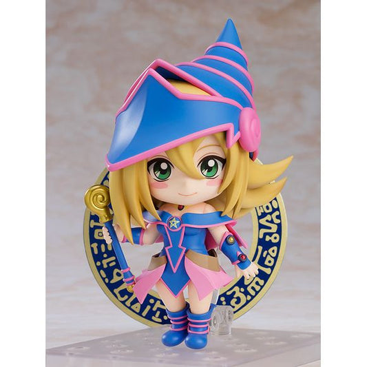 "Come! Dark Magician Girl!"

From the popular anime series "Yu-Gi-Oh!" comes a Nendoroid of Dark Magician Girl, apprentice of the ultimate wizard Dark Magician! She comes with two face plates including a smiling expression and a determined expression. Optional parts include her magic staff, a Dark Burning Magic effect part, one of the Kuriboh in Yugi's deck and the Flute of Summoning Kuriboh! A magic circle sheet is also included so you can display her being summoned! Be sure to add Nendoroid Dark Magicia