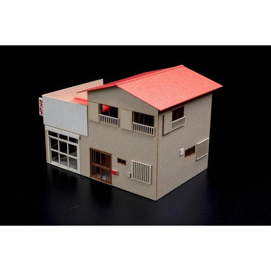<p><strong>PRE-ORDER: Expected to ship in April of 2027.</strong></p>

<p>Add some everyday street-level detail to your HO-scale layout or diorama with the Corner Store from PLUM's Town Corner Accessory Series.</p><p>This 1/80 scale paper kit recreates a small corner shop building, designed to sit alongside PLUM's other Town Corner and railway scenery kits for a lived-in Japanese townscape. Assembly required.</p><p>Made in Japan by PLUM (PM Office A). 1/80 scale, compatible with HO-gauge layouts.</p>