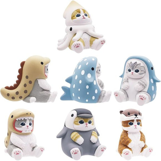 Discover the enchanting world of Mofusand Sitting Aquarium Cat Blind Box! Each box contains one of five adorable collectible mini figurines, featuring charming cats adorned in sea animal attire. With its delightful surprise element, this blind box adds fun and versatility to any space as a charming decoration. Embrace the joy of collecting and let these whimsical cat figurines brighten your day!