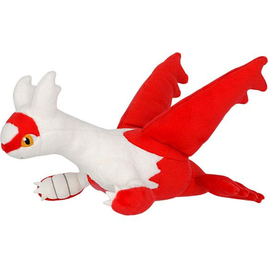 Latias is a Pokémon with a birdlike body stylized after a plane. Its long neck stretches forward from its squat body. It has no legs, usually floating instead. The rear half of its body is largely red and the upper half white, with jet-plane wings high on its rear and fins on the bottom near its tail. A blue triangle marks the center of its chest, while a red mask partially covers its face. Ear-like fins sit on top of its head and its eyes are yellow. Approx. Size: H 6" (15cm) x L 10.23" (26cm) x W 8.66" (2