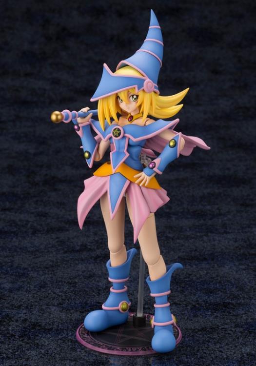 Kotobukiya is excited to present the Yu-Gi-Oh! Cross Frame Girl Dark Magician Girl Model Kit! This model kits comes with several accessories and interchangeable parts including 4 face parts, 5 pairs of wrists, 2 hats, 2 bang parts, a rod weapon, and a magic spellbook.