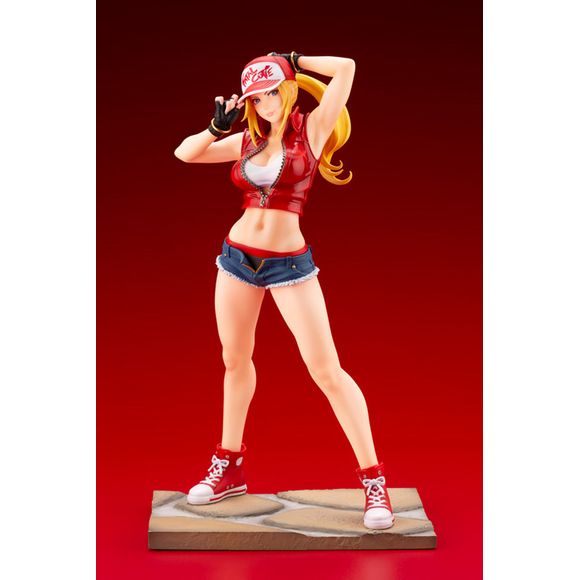 THIS'S WHAT MAKES A LEGEND! 

Adored by children for his bright personality, the friendly fighter Terry Bogard from SNK Heroines: Tag Team Frenzy joins the BISHOUJO series lineup after being transformed into a girl by a certain someone! The city’s hero was stylized by the beloved illustrator Shunya Yamashita just for this figure, which will be brought to life by sculptor Yoshiki Fujimoto.This statue puts a spin on the Legendary Hungry Wolf’s outfit while retaining the iconic American style with the red jack