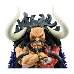 This figure of Kaido stands strong. Wearing his royal blue, feathered overcoat, and a menacing scowl, this Kaido figure is sure to make a great addition to your One Piece collection!  Made of plastic.