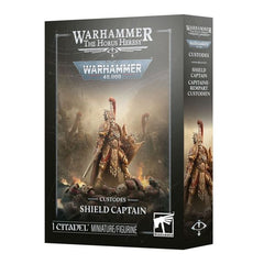Release Date 10/17/2026
<p><strong>Warhammer: Adeptus Custodes – Shield Captain</strong> adds a powerful commander to your Adeptus Custodes or Legio Custodes force. Clad in ornate armor and equipped with an Eternity Blade and Praesidium Shield, this elite leader combines exceptional durability, battlefield authority, and deadly close-combat ability.</p>

<p>This multipart plastic kit builds 1 Shield Captain and includes 24 plastic components, a Citadel 40mm round base, and a choice of helmeted or bare head