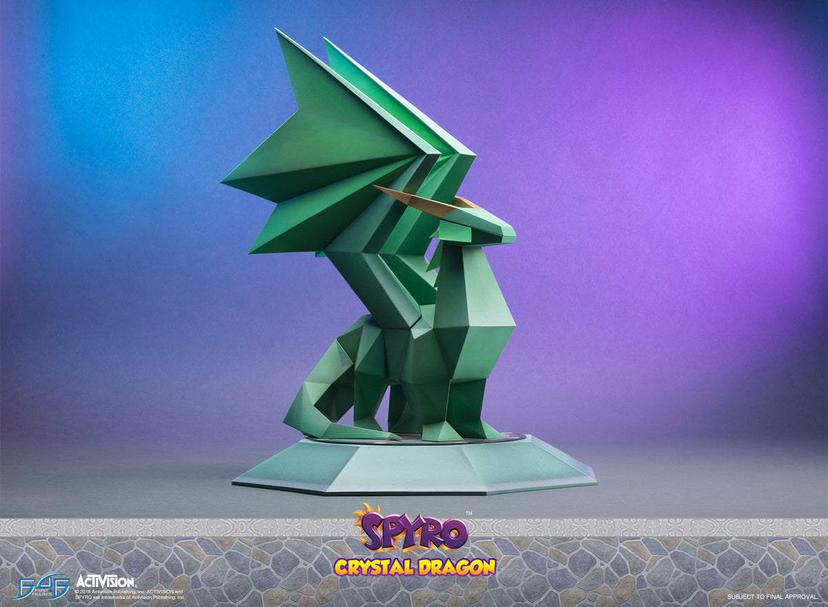 This statue has no edition number, and was a replacement and is in new and unopened condition. 

In order to free the dragons, Spyro must step into the statue's pedestal. There imprisoned dragon breaks free after a flash of bright light.

The Crystal Dragon statues are one of the main collectibles in the Spyro the Dragon games.

Spyro the Dragon - Crystal Dragon REGULAR edition comes with the following:-

Spyro the Dragon - Crystal Dragon Statue
Highly detailed base replicating the exact same pedestal strai