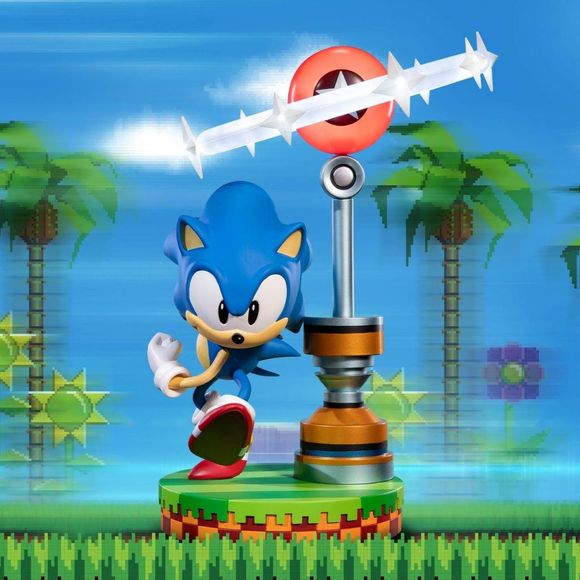 This statue has no edition number, and was a replacement and is in new and unopened condition. 

The highly detailed Sonic PVC statue is seen striking a dynamic pose, revving up to run faster than the speed of sound. The base design is inspired by the Green Hill Zone, and on it is also the Star Post checkpoint, which you can rotate up to 90 degrees, allowing for multiple viewing angles. With the Exclusive Edition, you also receive First 4 Figures' beautifully designed signature Premium Deluxe Box, which per