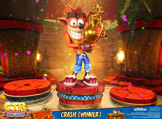 First 4 Figures is proud to introduce their latest resin collectible, Crash (Winner).

The concept for this statue is based on the Crash Team Racing™ Nitro-Fueled logo in the home screen of the game, where Crash is holding the trophy. The base design replicates the winners' pedestal from the iconic N. Sanity Beach area, which is the first area in the game.

And, speaking of base, looking at the number of layers on the base and the fact that the rings around the base are gold, you can tell that Crash took 1s