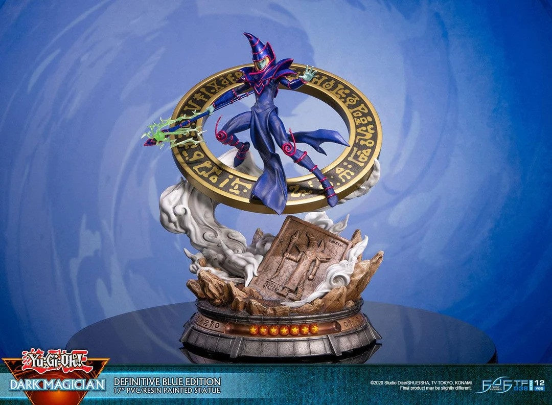 The statue's concept is inspired by one of Dark Magician's iconic summoning poses in the anime, where he's in this "ready for action" stance with the Dark Magical Circle in the background. He has his left arm stretched out and is wielding the Magician's Rod in his right hand, ready to cast his signature spell: Dark Magic Attack. The Definitive Edition of this statue comes with LED functionality for the Dark Magical Circle, as well as glow-in-the-dark attack effects on the Magician's Rod.

Since the Dark Mag