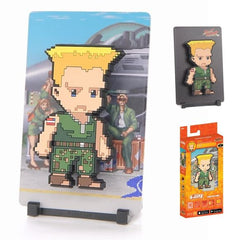 A stoic military man on a mission to take down Shadaloo.

FiGGYZ are Pop Magnet Collectibles - pixel-art characters that snap magnetically onto display-ready backdrops.

Each one features:

A reversible metal display
Side A: Themed background related to the character
Side B: Classic Background, typically of the franchise
A magnetized figure raised off the surface using MagMounts™ for a 3D pop out feeling
Comes with a display base for shelves and a magnetic sticker for mounting on any vertical surface.