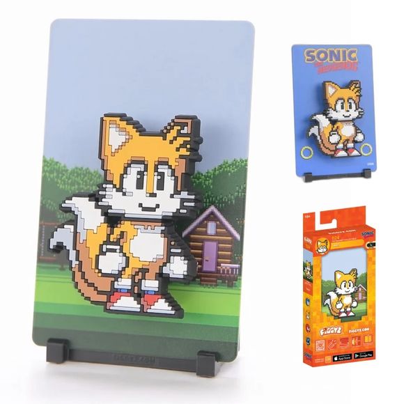 A genius two-tailed fox who is Sonic's loyal sidekick and a skilled pilot and inventor.

FiGGYZ are Pop Magnet Collectibles - pixel-art characters that snap magnetically onto display-ready backdrops.

Each one features:

A reversible metal display
Side A: Themed background related to the character
Side B: Classic Background, typically of the franchise
A magnetized figure raised off the surface using MagMounts™ for a 3D pop out feeling
Comes with a display base for shelves and a magnetic sticker for mounting