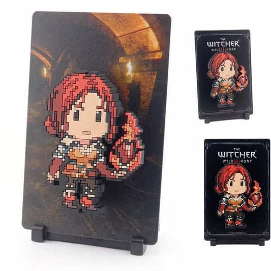 Triss Merigold’s warm and personable charm has won over many powerful friends, but her own magical firepower is not to be overlooked.

FiGGYZ are Pop Magnet Collectibles - pixel-art characters that snap magnetically onto display-ready backdrops.

Each one features:

A reversible metal display
Side A: Themed background related to the character
Side B: Classic Background, typically of the franchise
A magnetized figure raised off the surface using MagMounts™ for a 3D pop out feeling
Comes with a display base f