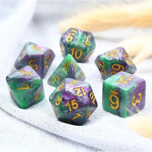 The perfect companion for your gaming needs! These HD acrylic dice are exactly what you've been searching for that upcoming game night with the group. This set includes on of each: d20, d12, d10, d10 (percentile), d8, d6, and a d4 (7 dice in total) in a king cake finish!