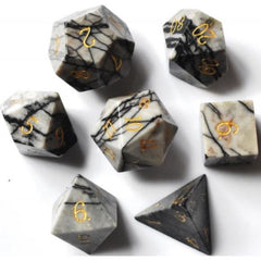 The perfect companion for your gaming needs! These premium, high-end cut stone polyhedral dice are exactly what you've been searching for that upcoming game night with the group. Each set weighs roughly 8 ounces and are stored in a quality, brushed metal tin with foam insert. These dice are a rich quality stone with nice weight to them and engraved each with crisp, easy-to-read numerals. Many styles and colors are available.

This set includes one of each: d20, d12, d10, d10 (percentile), d8, d6, and a d4 (