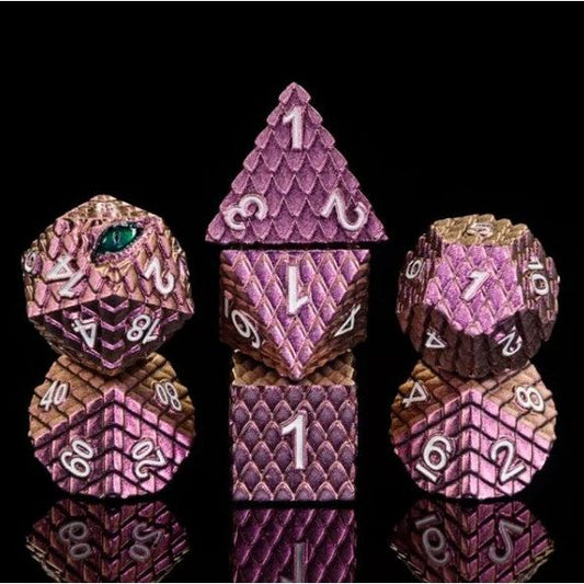 The perfect companion for your gaming needs! These premium die-cast polyhedral dice are exactly what you've been searching for that upcoming game night with the group. Each set weighs roughly 5 ounces and are stored in a quality, brushed metal tin with foam insert. These dice are engraved with crisp, easy-to-read numerals. Many styles and colors are available.

This set includes one of each: d20, d12, d10, d10 (percentile), d8, d6, and a d4 (7 dice in total). All inside a premium Dice Tin.