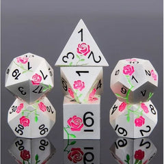 The perfect companion for your gaming needs! These premium die-cast polyhedral dice are exactly what you've been searching for that upcoming game night with the group. Each set weighs roughly 5 ounces and are stored in a quality, brushed metal tin with foam insert. These dice are engraved with crisp, easy-to-read numerals. Many styles and colors are available.

This set includes one of each: d20, d12, d10, d10 (percentile), d8, d6, and a d4 (7 dice in total). All inside a premium Dice Tin.