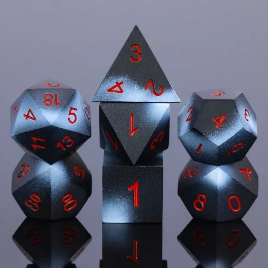 The perfect companion for your gaming needs! These premium die-cast polyhedral dice are exactly what you've been searching for that upcoming game night with the group. Each set weighs roughly 5 ounces and are stored in a quality, brushed metal tin with foam insert. These dice are engraved with crisp, easy-to-read numerals. Many styles and colors are available.

This set includes one of each: d20, d12, d10, d10 (percentile), d8, d6, and a d4 (7 dice in total). All inside a premium Dice Tin.