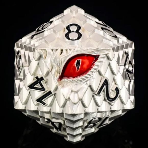 The perfect companion for your gaming needs! These premium die-cast polyhedral dice are exactly what you've been searching for that upcoming game night with the group. These dice are engraved with crisp, easy-to-read numerals. This particular D20 silver dragon has a red eye