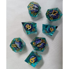 The perfect companion for your gaming needs! These premium, high-end resin are exactly what you've been searching for that upcoming game night with the group. These dice are quality resin with nice weight to them and engraved each with crisp, easy-to-read numerals. Many styles and colors are available.

This set includes one of each: d20, d12, d10, d10 (percentile), d8, d6, and a d4 (7 dice in total)! 

WARNING: These dice are extra sharp! Use with caution