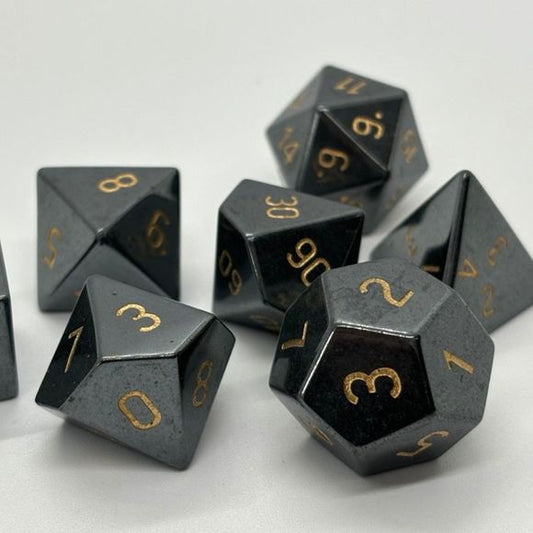 Galactic Dice Premium Dice Sets - Hematite with Gold Numbers Set of 7 Stone Dice with Tin | Galactic Toys & Collectibles