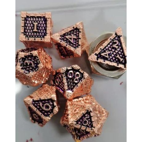 The perfect companion for your gaming needs! These premium die-cast polyhedral dice are exactly what you've been searching for that upcoming game night with the group. Each set weighs roughly 5 ounces and are stored in a quality, brushed metal tin with foam insert. These dice are engraved with crisp, easy-to-read numerals. Many styles and colors are available.

This set includes on of each: d20, d12, d10, d10 (percentile), d8, d6, and a d4 (7 dice in total). All inside the Galactic Toys Dice Tin.